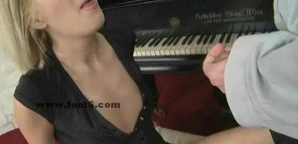  Blonde cutie playing the piano feet sex